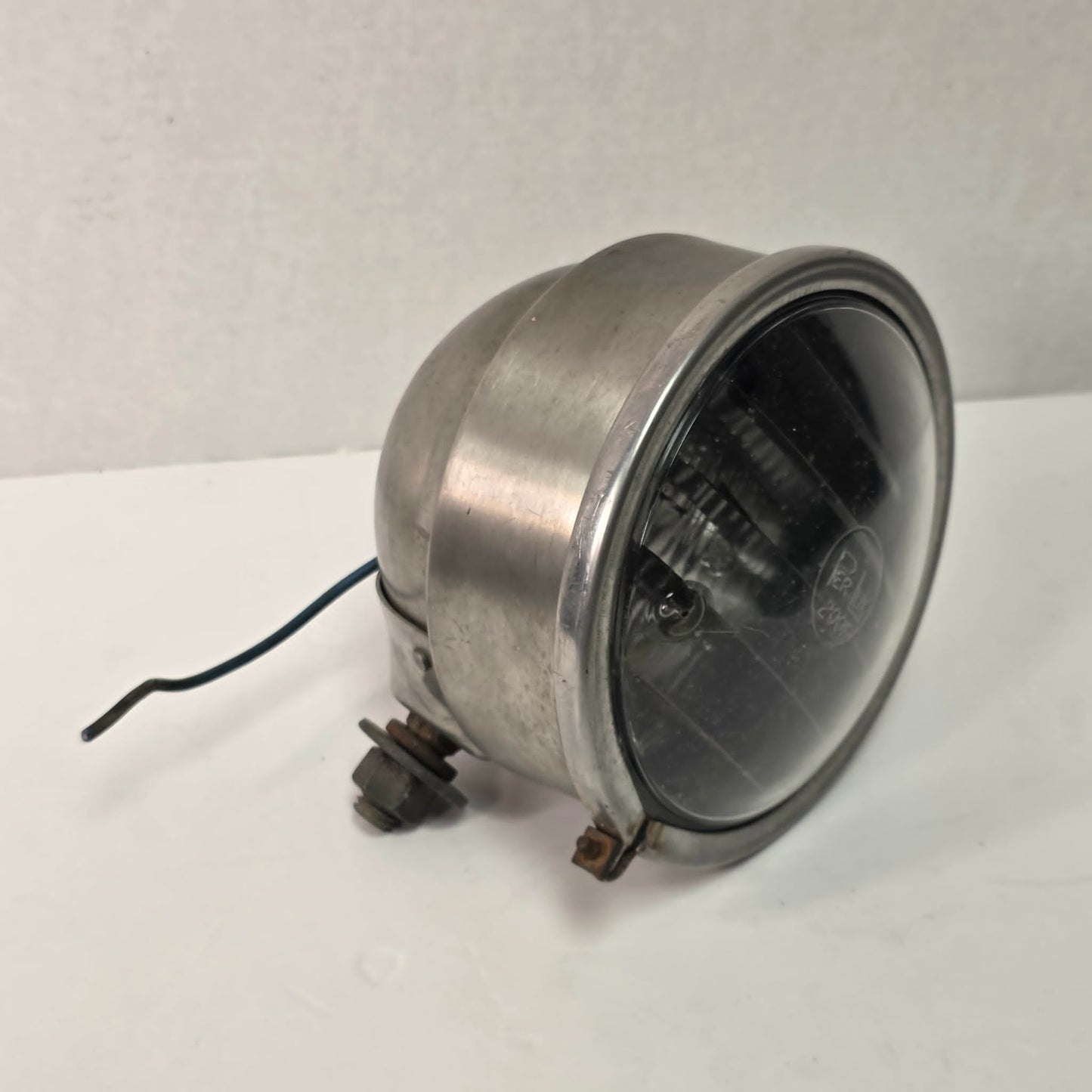 Vintage Perlux 200T stainless steel industrial spotlight with railway character.