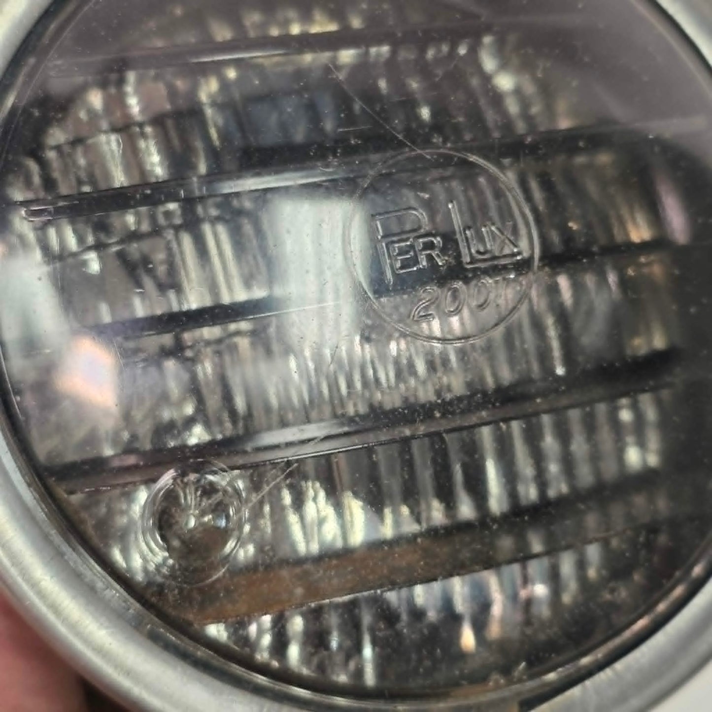 Vintage Perlux 200T stainless steel industrial spotlight with railway character.