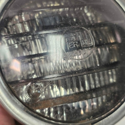 Vintage Perlux 200T stainless steel industrial spotlight with railway character.