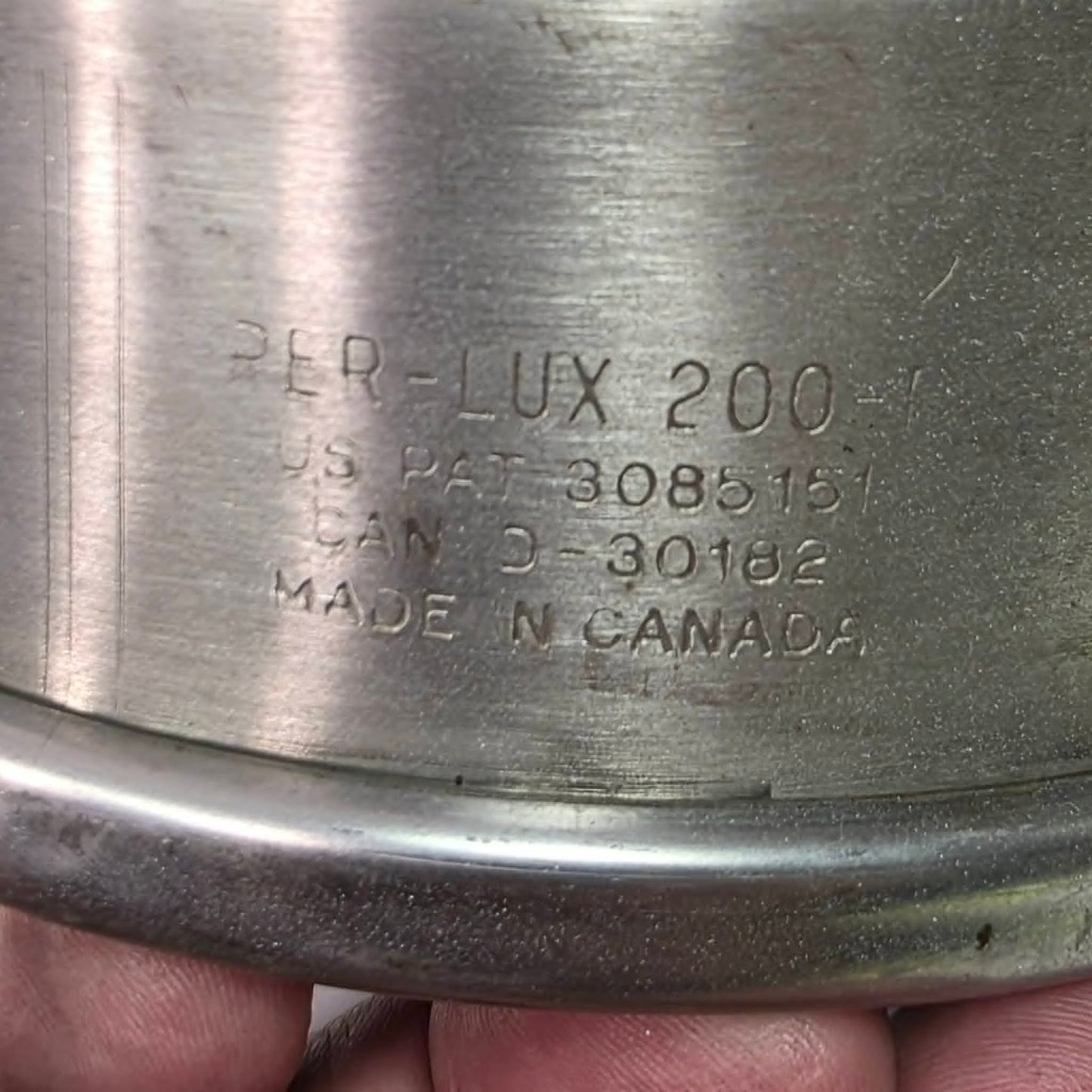 Vintage Perlux 200T stainless steel industrial spotlight with railway character.