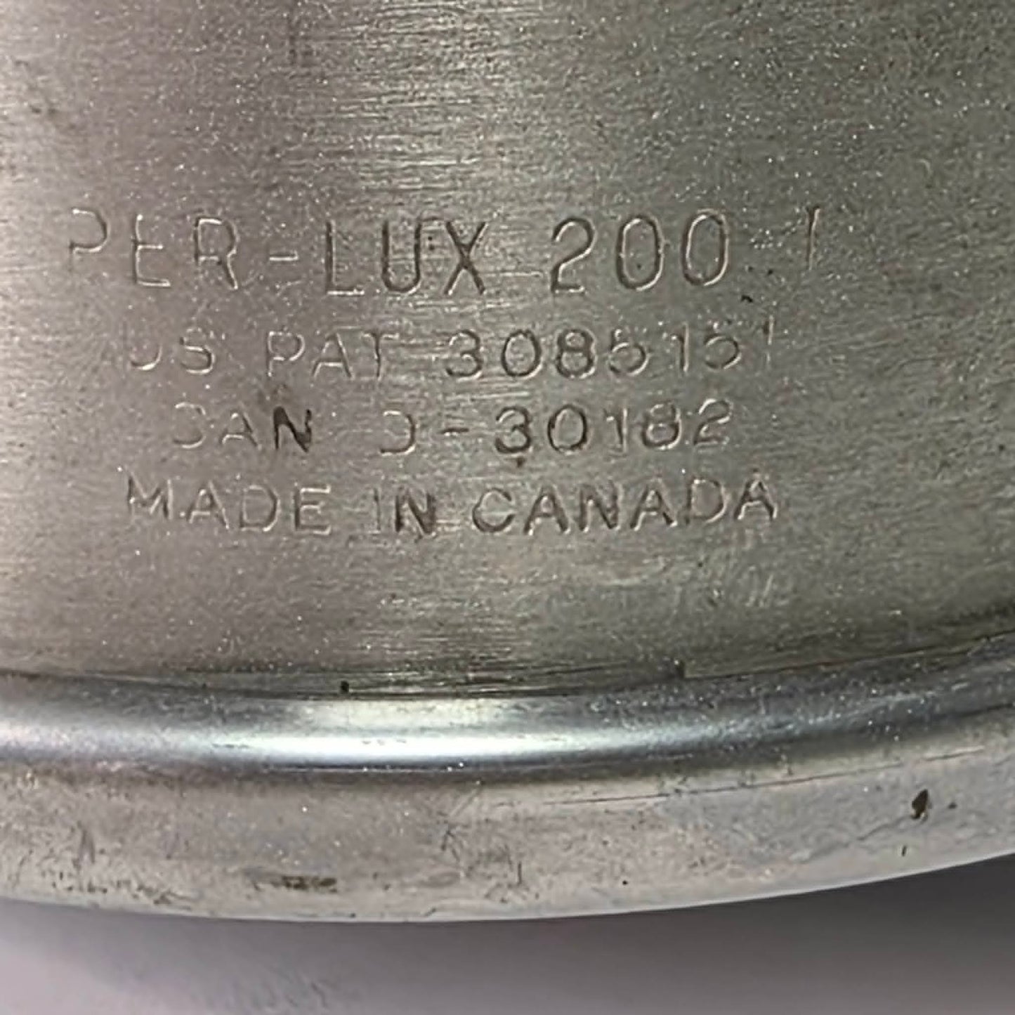 Vintage Perlux 200T stainless steel industrial spotlight with railway character.