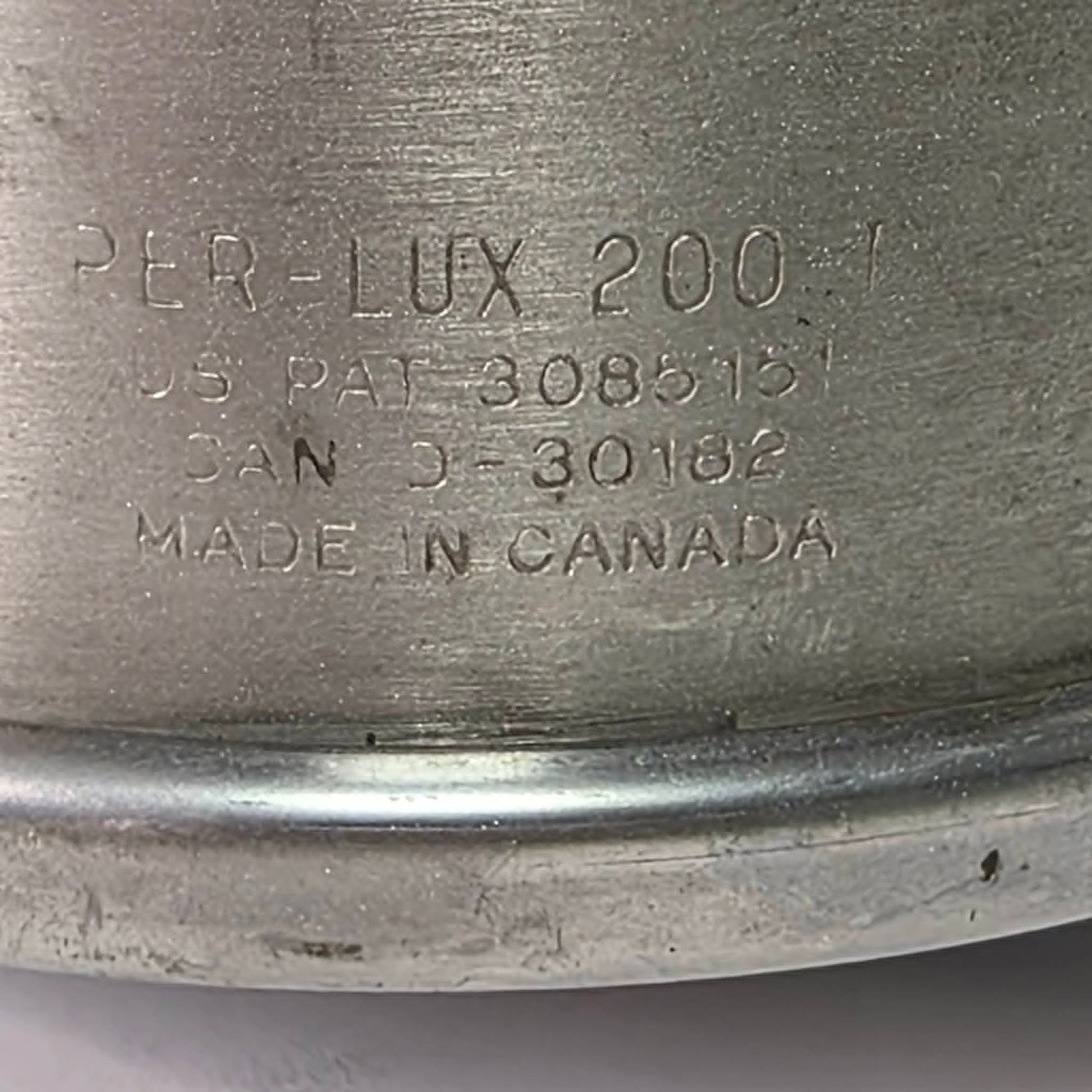 Vintage Perlux 200T stainless steel industrial spotlight with railway character.