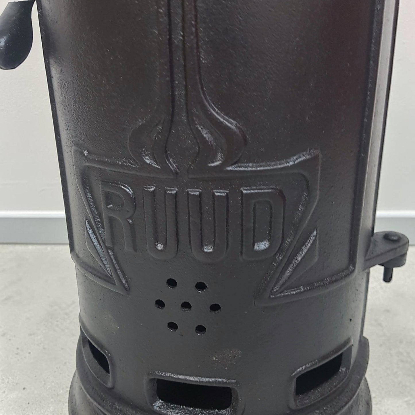 Antique RUUD No. 25 cast iron hot water heater tank.
