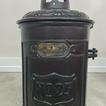 Antique RUUD No. 25 cast iron hot water heater tank.
