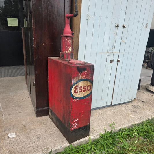Antique Esso-branded lubester oil tank with Gilbert and Barker brass identification tag
