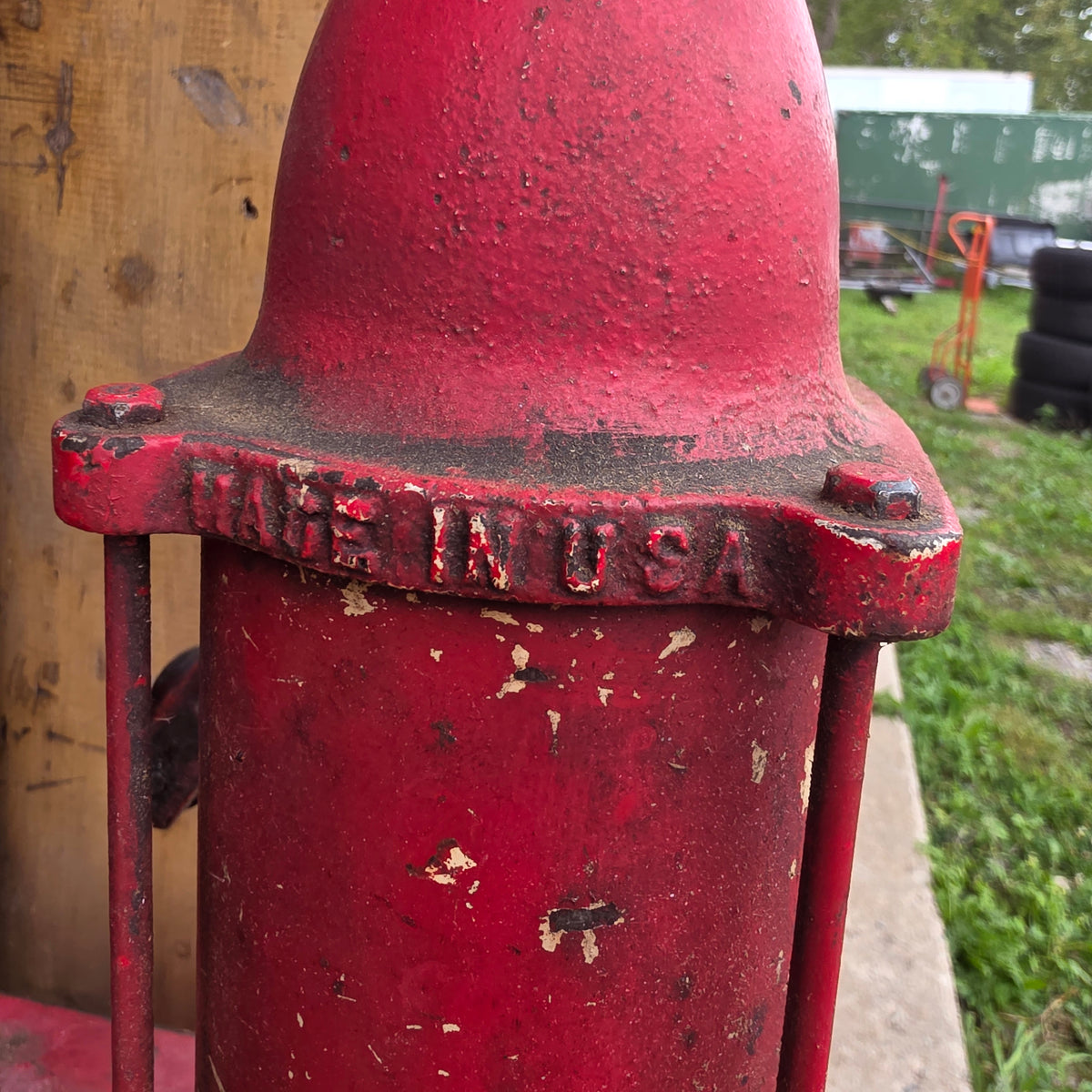 Antique Esso-branded lubester oil tank with Gilbert and Barker brass identification tag
