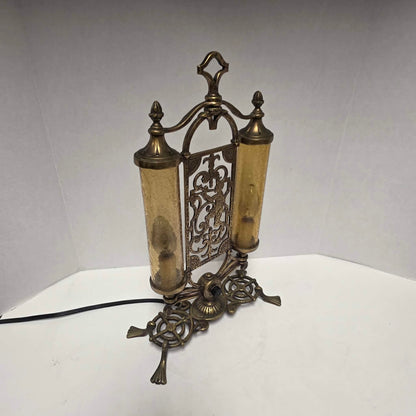 Exceptional Art Deco Mutual Sunset bronze lamp with Pan figure, original patina, and amber glass shades.