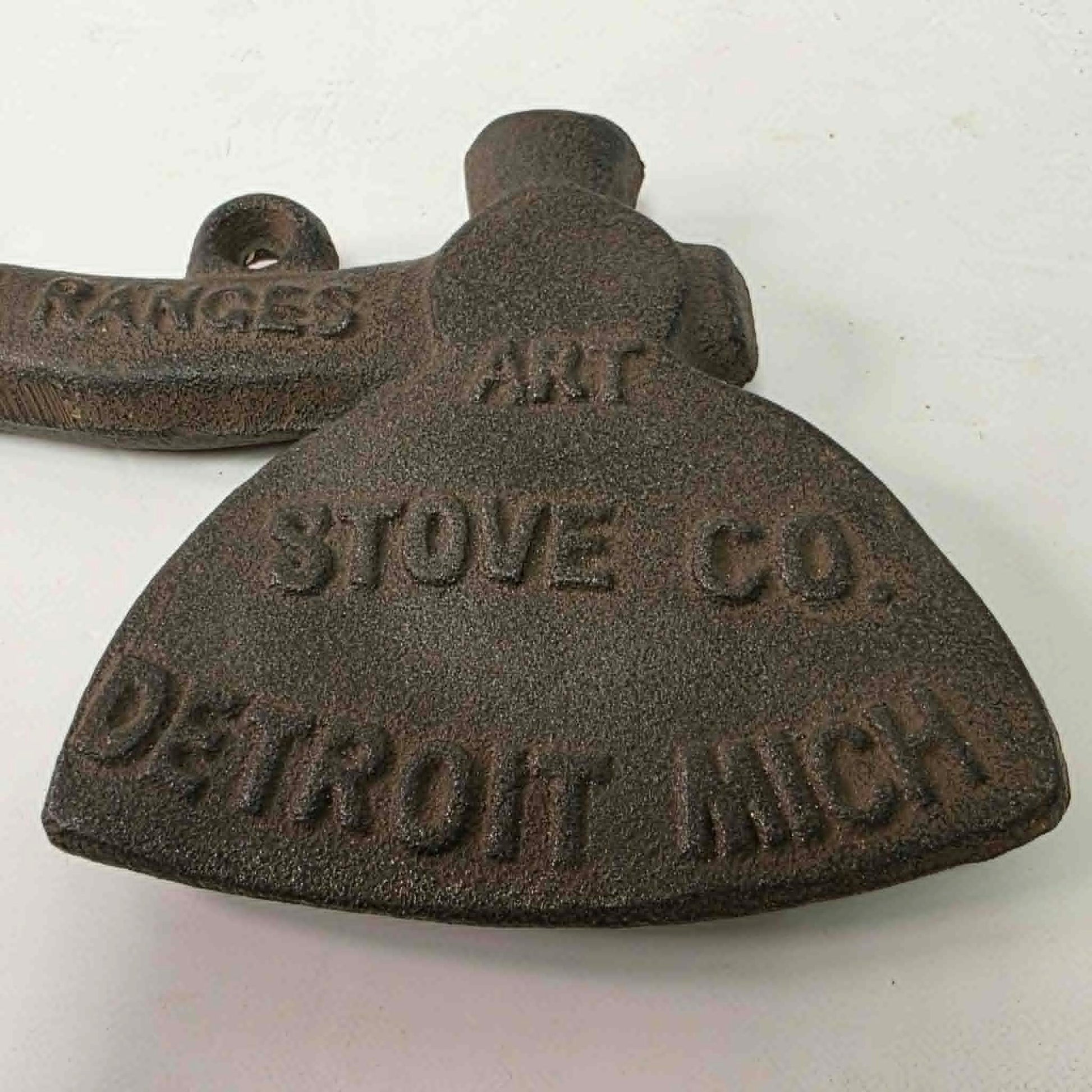 Early 1900s cast iron Carrie Nation temperance advertising axe with detailed relief portrait and slogan.