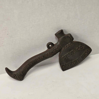 Early 1900s cast iron Carrie Nation temperance advertising axe with detailed relief portrait and slogan.