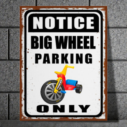 Metal sign with a tricycle graphic and text 'Notice Big Wheel Parking Only' on a brick wall background.