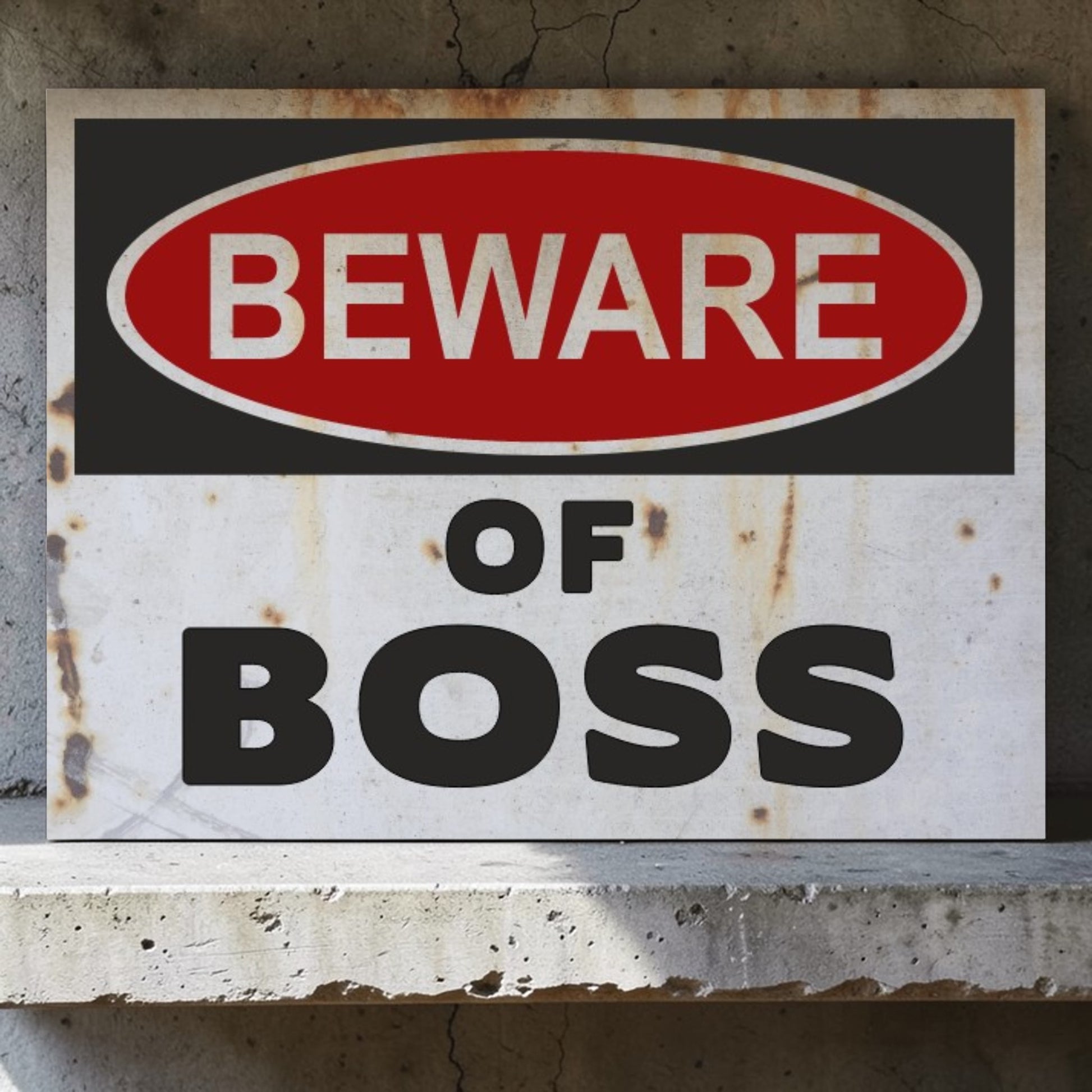 Rust-colored warning sign with 'BEWARE OF BOSS' text on a concrete surface.