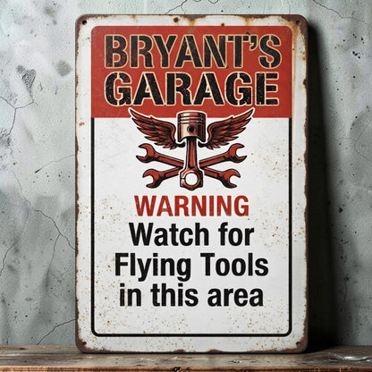 Rustic personalized Dad's Garage and Granddad's Garage metal sign with flying tools warning.
