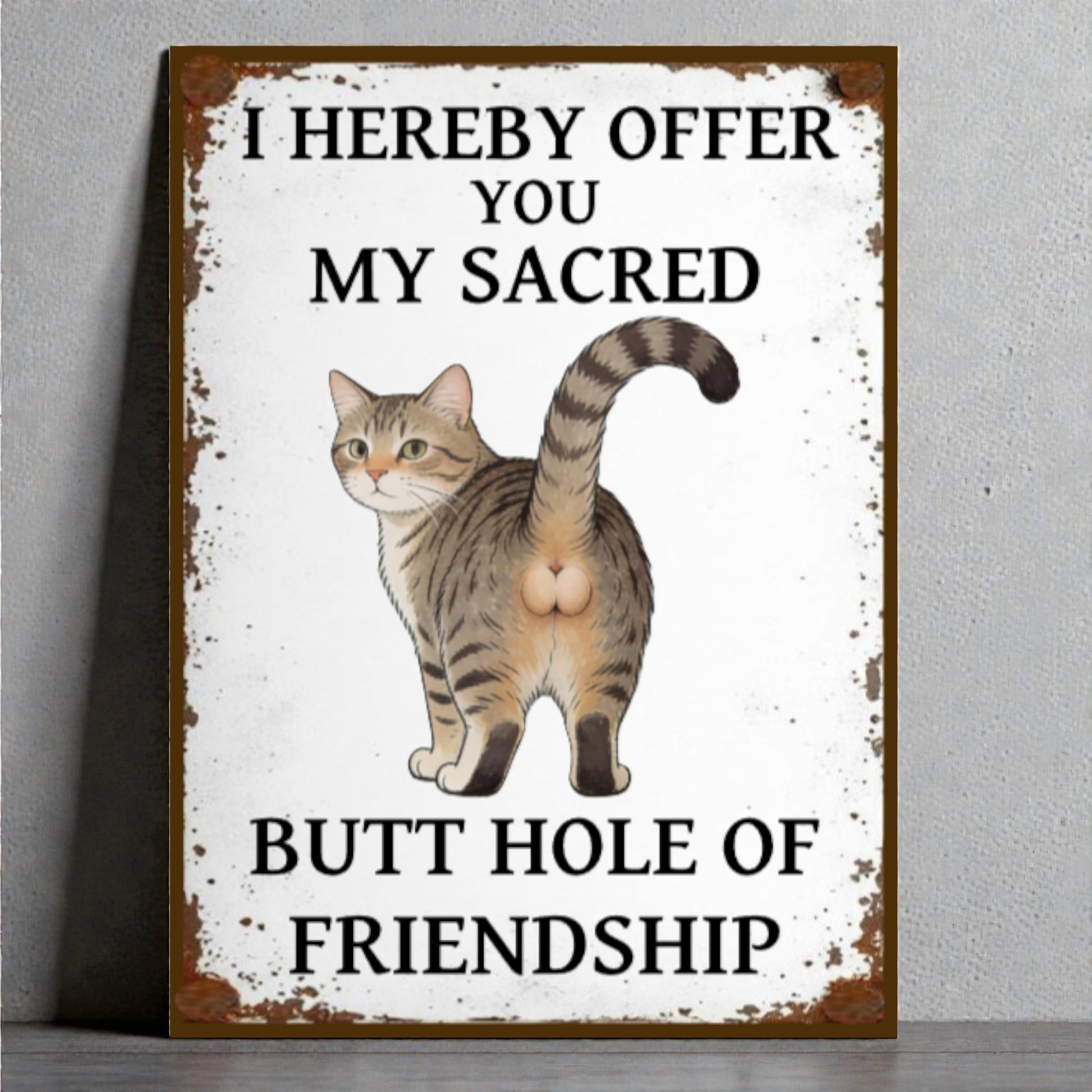 sign with a cat illustration and humorous text on a white background.