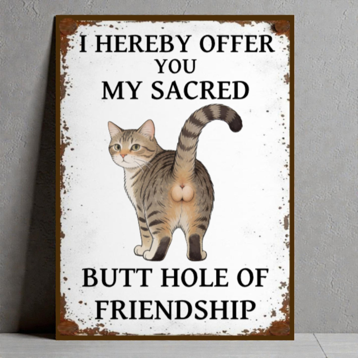 sign with a cat illustration and humorous text on a white background.