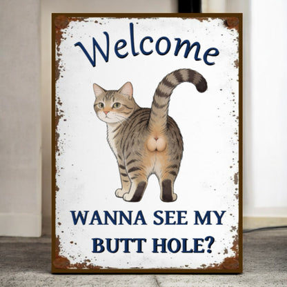 Sign with a cat illustration and humorous text on a white background