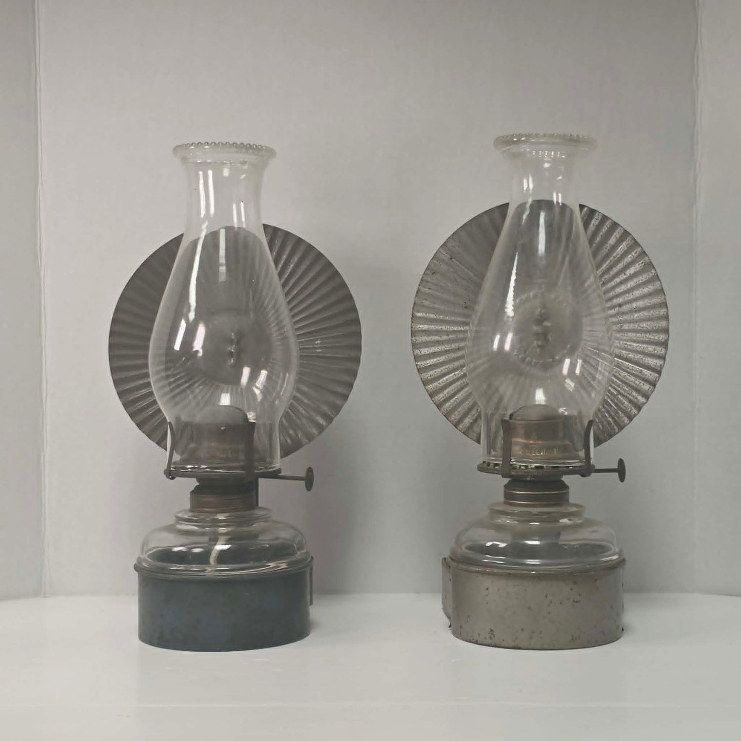 Beautiful matched pair of Queen Mary kerosene lamps with original Pycrest chimneys and pleated reflectors.