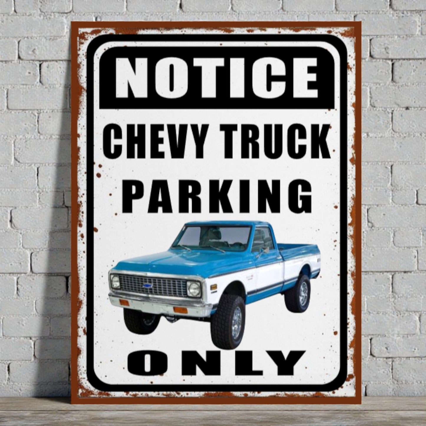 Vintage-style sign with a blue and white Chevy truck on a brick wall background