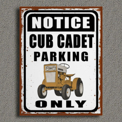 Vintage-style sign with a Cub Cadet tractor illustration and text on a gray background