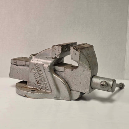 Heavy-duty antique RAE bench vise from Hamilton, Canada with 3.5-inch jaws and industrial steel construction.