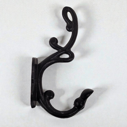 Black metal double hook on a white background