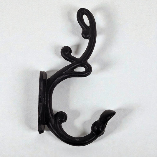 Black metal double hook on a white background