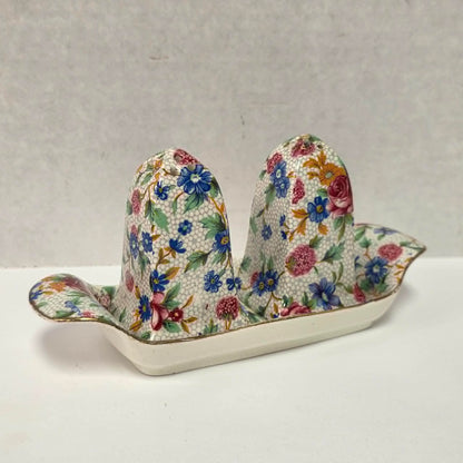 Antique Royal Grimwades Old Cottage Chintz salt and pepper shakers with matching tray.
