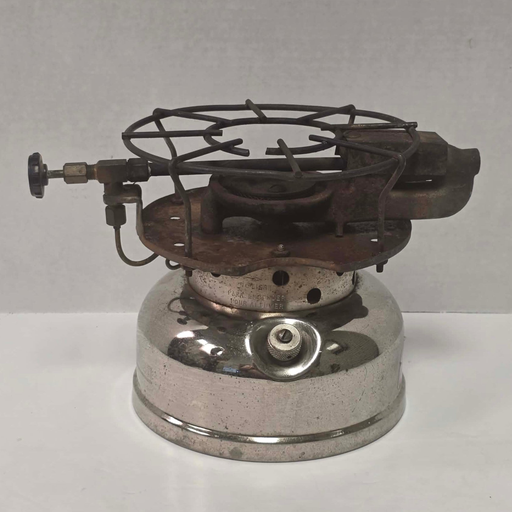 1962 Canadian Coleman Model 500 camp stove with Kit 1 stencil remnants and nickel finish.
