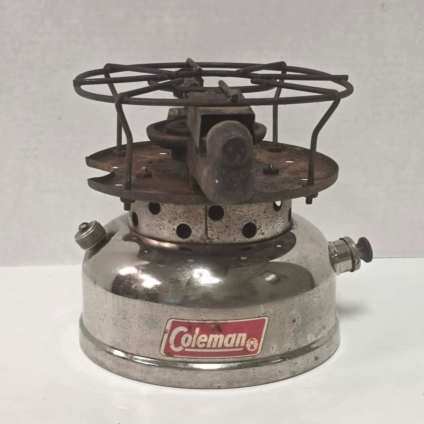 1962 Canadian Coleman Model 500 camp stove with Kit 1 stencil remnants and nickel finish.
