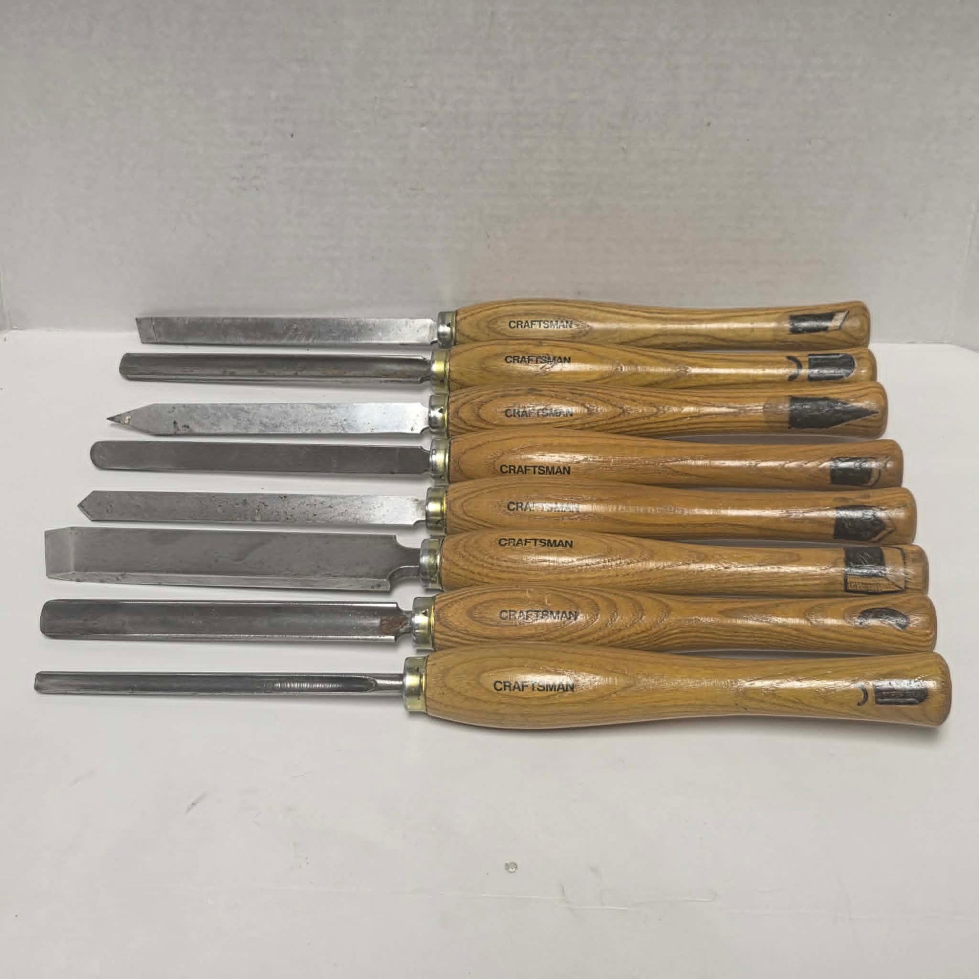 Complete set of eight vintage Craftsman wood lathe turning chisels with hardwood handles.
