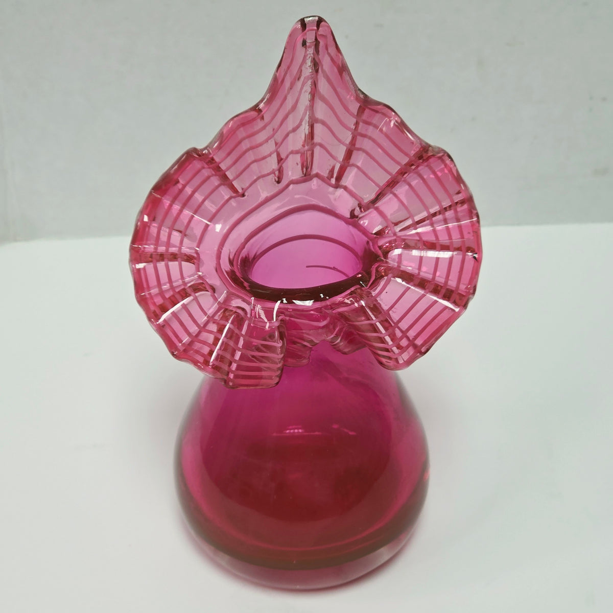 Vintage ruffled Jack-in-the-pulpit vase with white appliqué lace rim
