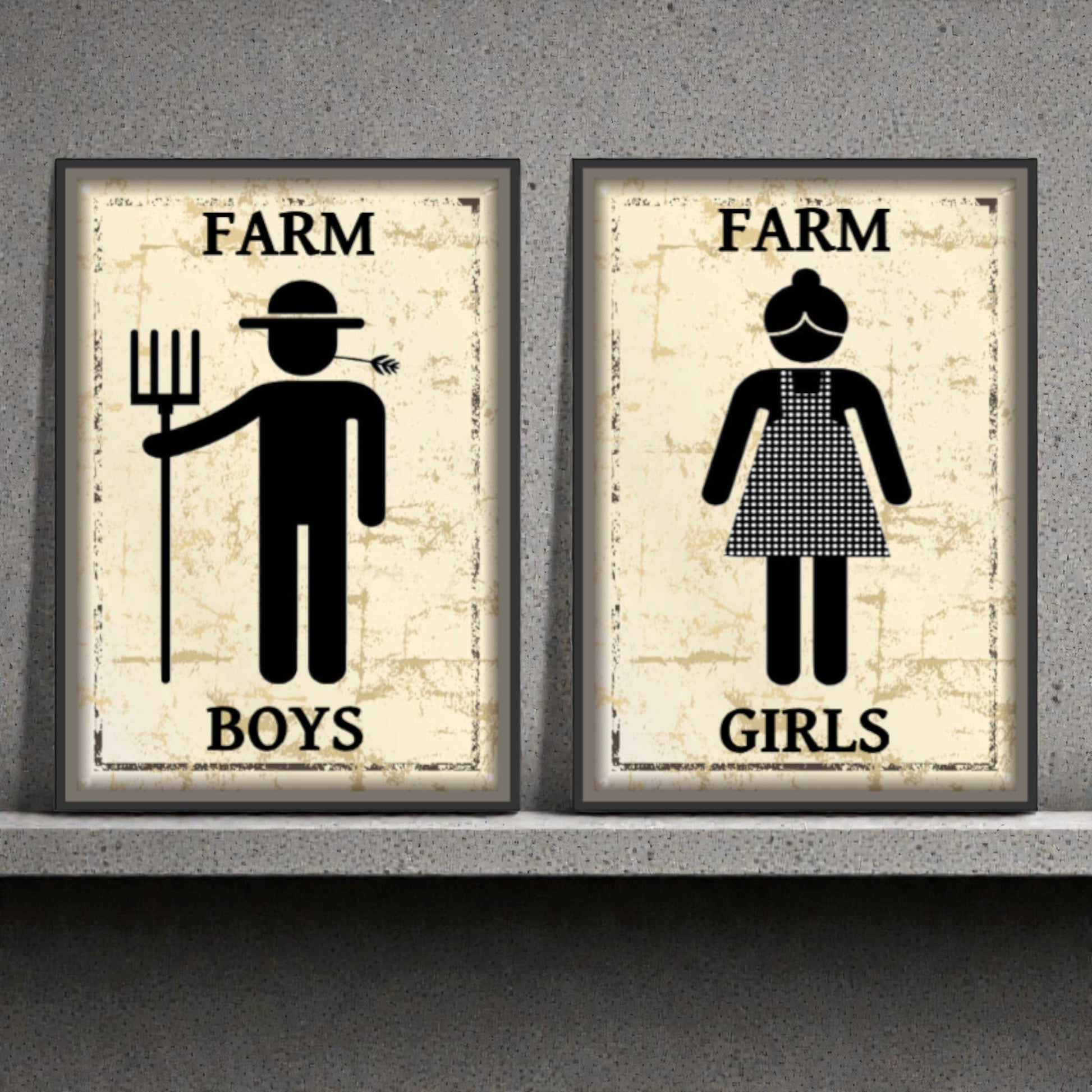 Two framed posters labeled 'Farm Boys' and 'Farm Girls' on a concrete wall.