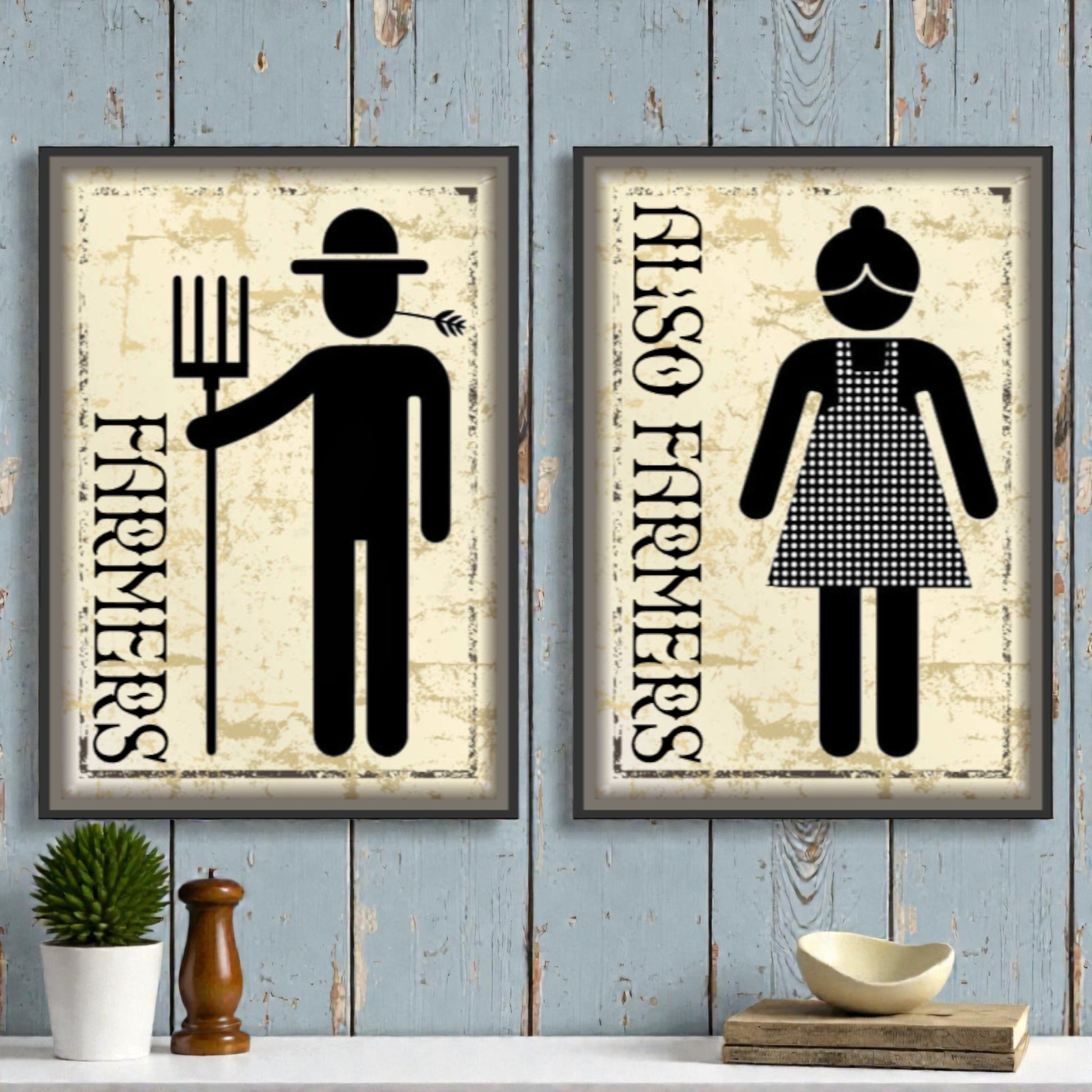 Two framed prints on a wooden wall with 'Farmers' and 'Also Farmers' text.