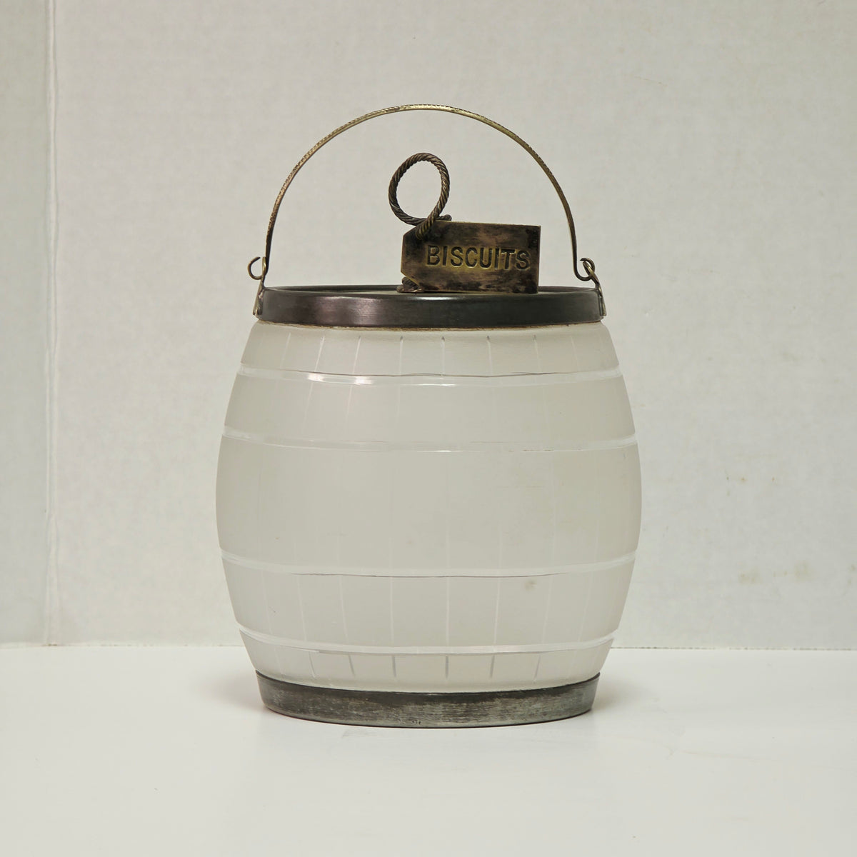 Victorian frosted glass biscuit barrel shaped like a wooden keg with silver accents
