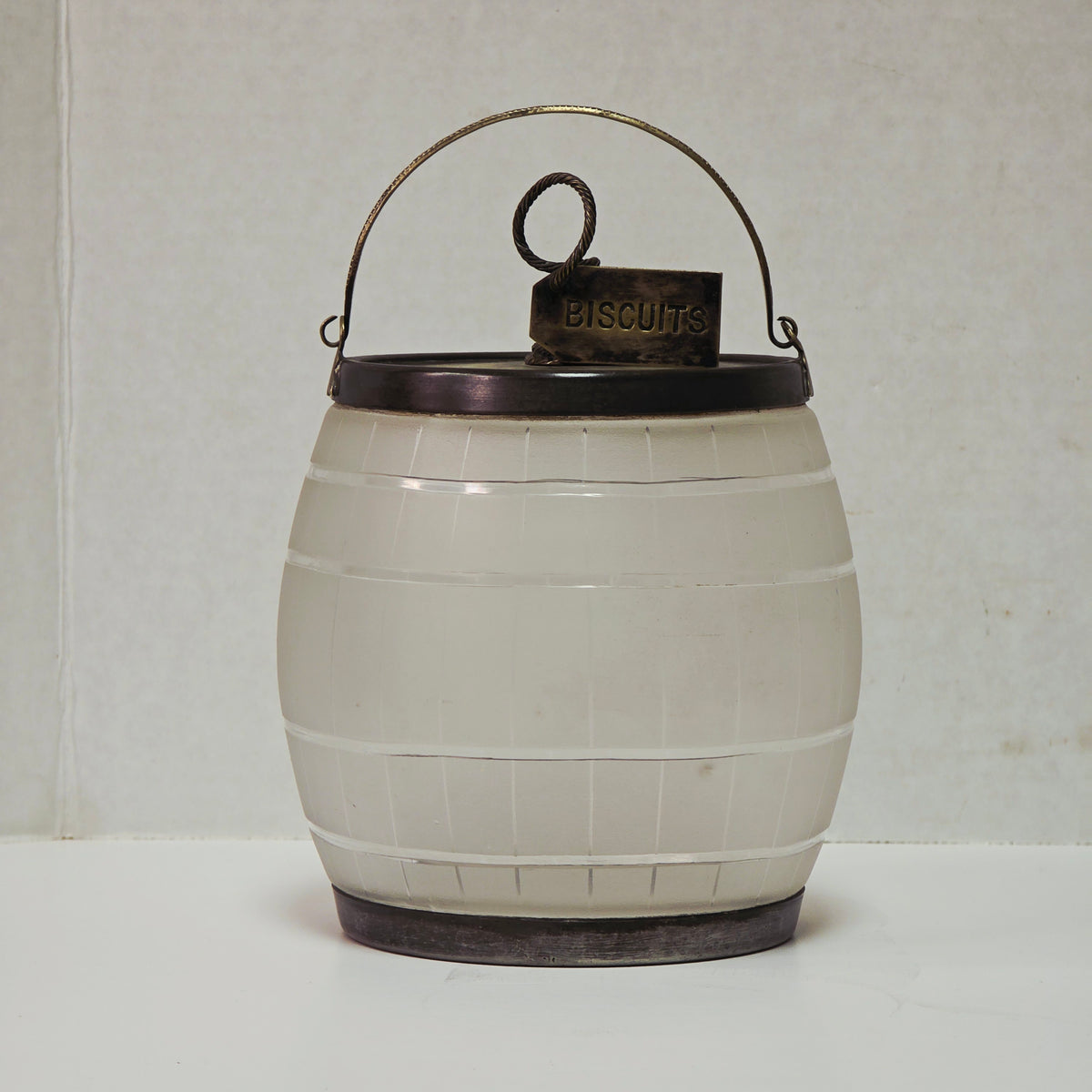 Victorian frosted glass biscuit barrel shaped like a wooden keg with silver accents
