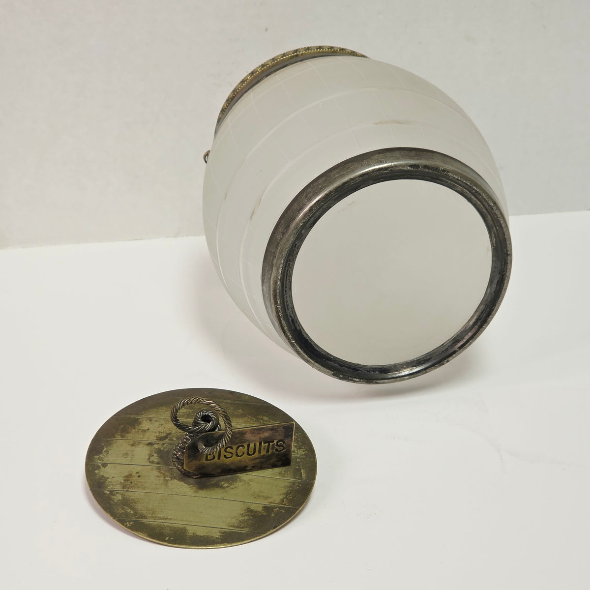 Victorian frosted glass biscuit barrel shaped like a wooden keg with silver accents
