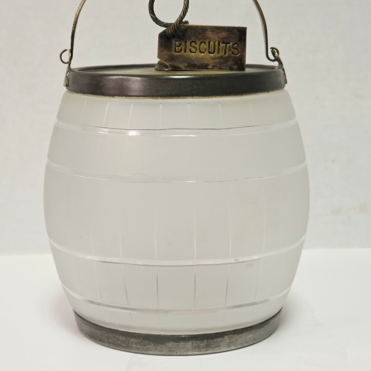 Victorian frosted glass biscuit barrel shaped like a wooden keg with silver accents
