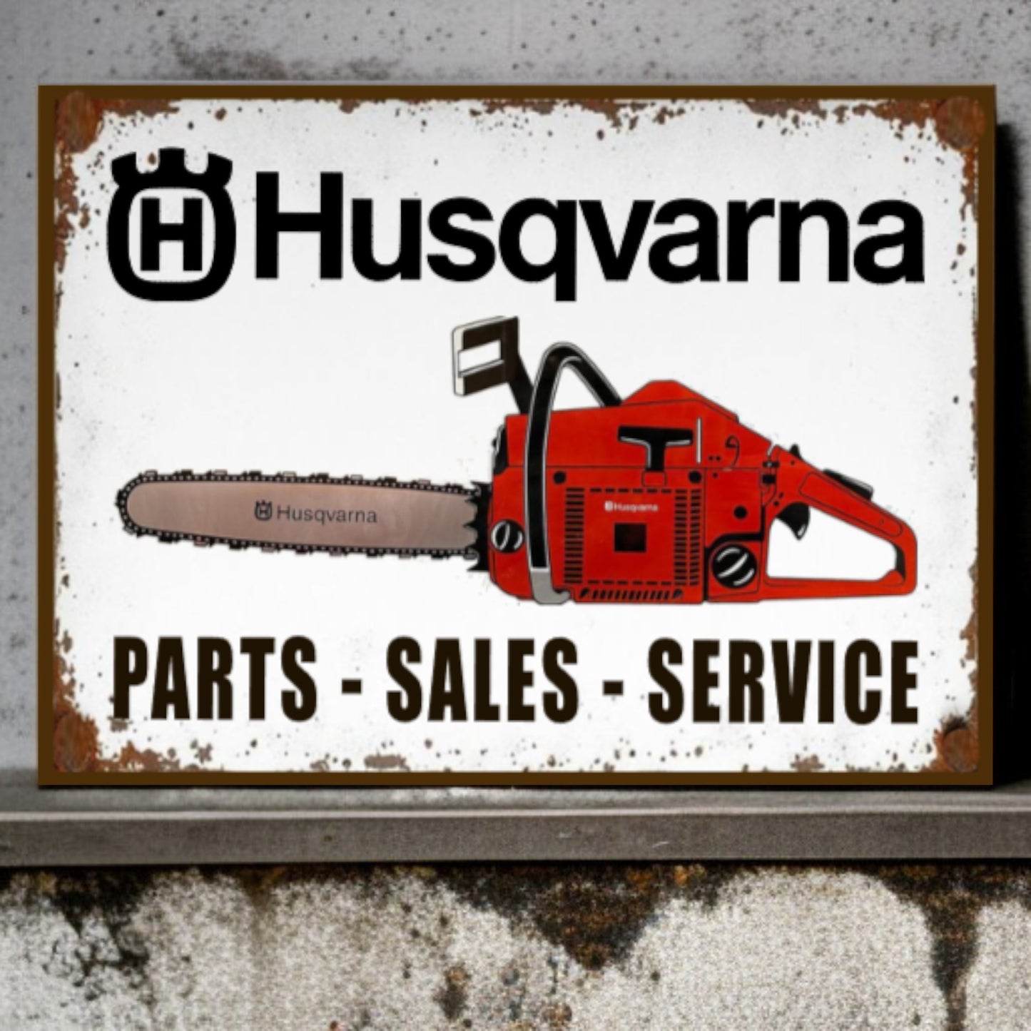 Husqvarna sign with a chainsaw graphic on a white background