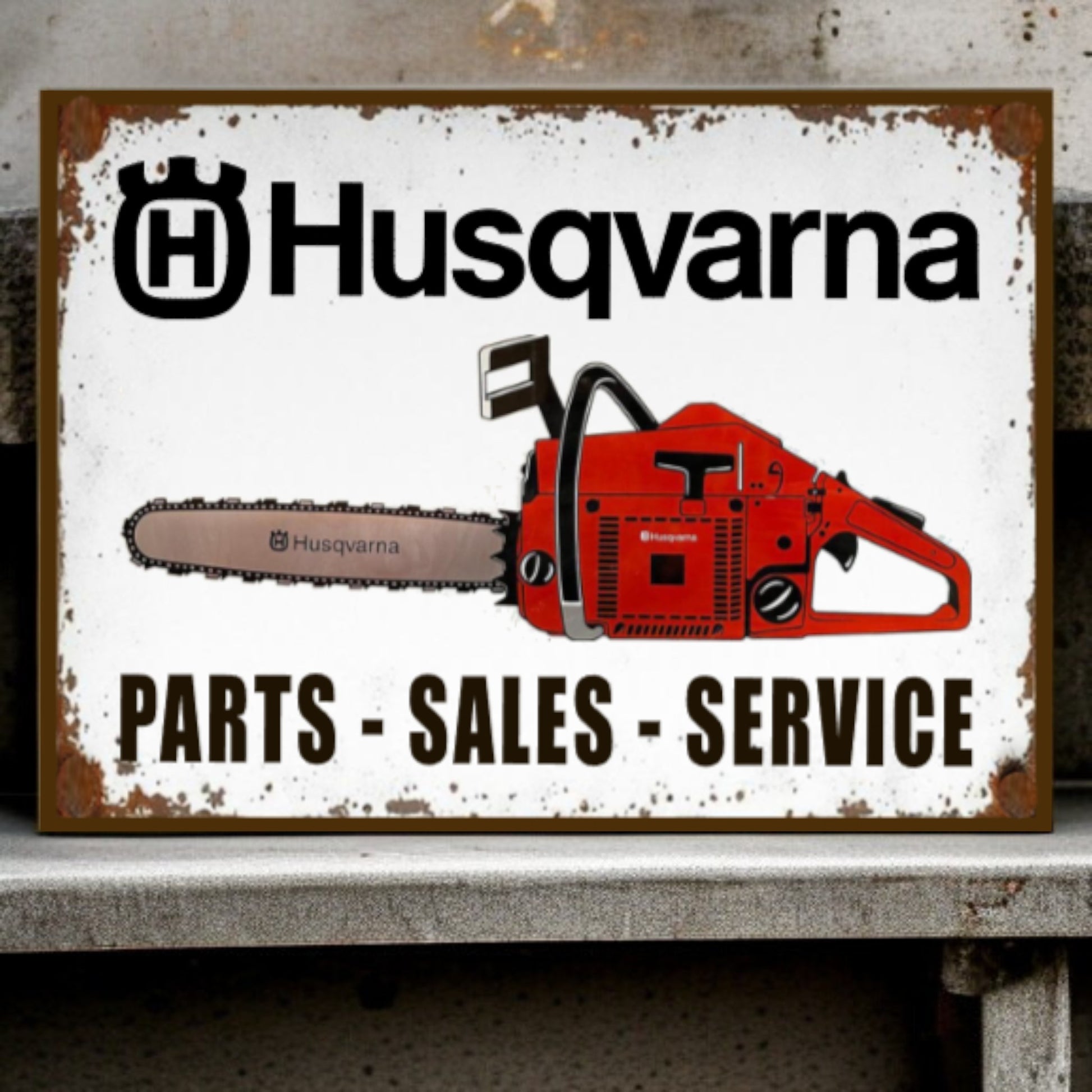 Husqvarna sign with a chainsaw graphic on a white background