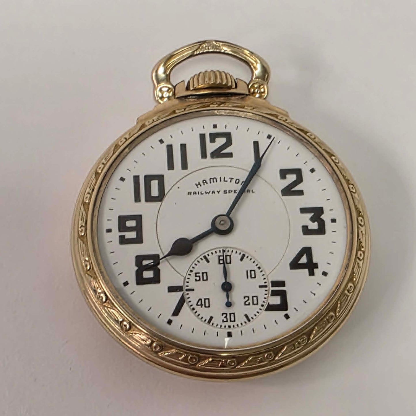 Hamilton 992B Railway Special Size 16 pocket watch with triple-sunk porcelain dial and original gold-filled scroll case.