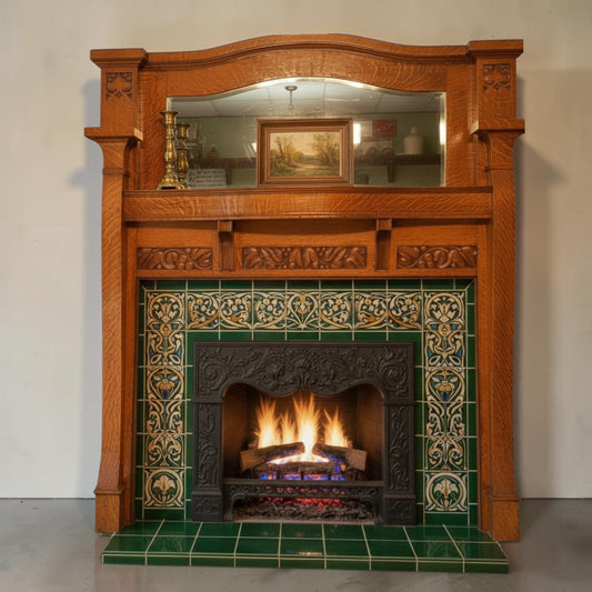 Historic Arts & Crafts oak fireplace mantle with original beveled mirror.