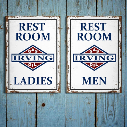Two vintage-style restroom signs for Irving Oil on a wooden background.