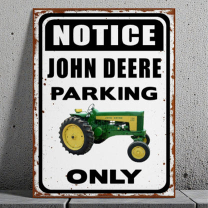 Vintage-style sign with a John Deere tractor and text 'Notice John Deere Parking Only' on a textured wall.