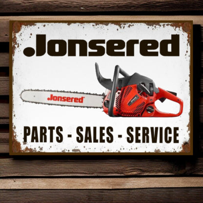 Jonsered chainsaw on a sign with 'Parts - Sales - Service' text on a wooden background