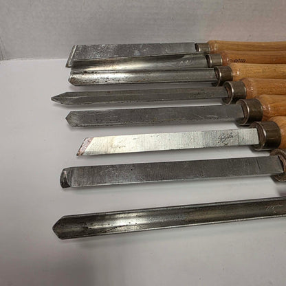 A rare signed set of eight Józef Gajka European woodturning chisels showcasing traditional Polish toolmaking craftsmanship.