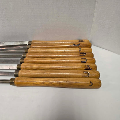 A rare signed set of eight Józef Gajka European woodturning chisels showcasing traditional Polish toolmaking craftsmanship.