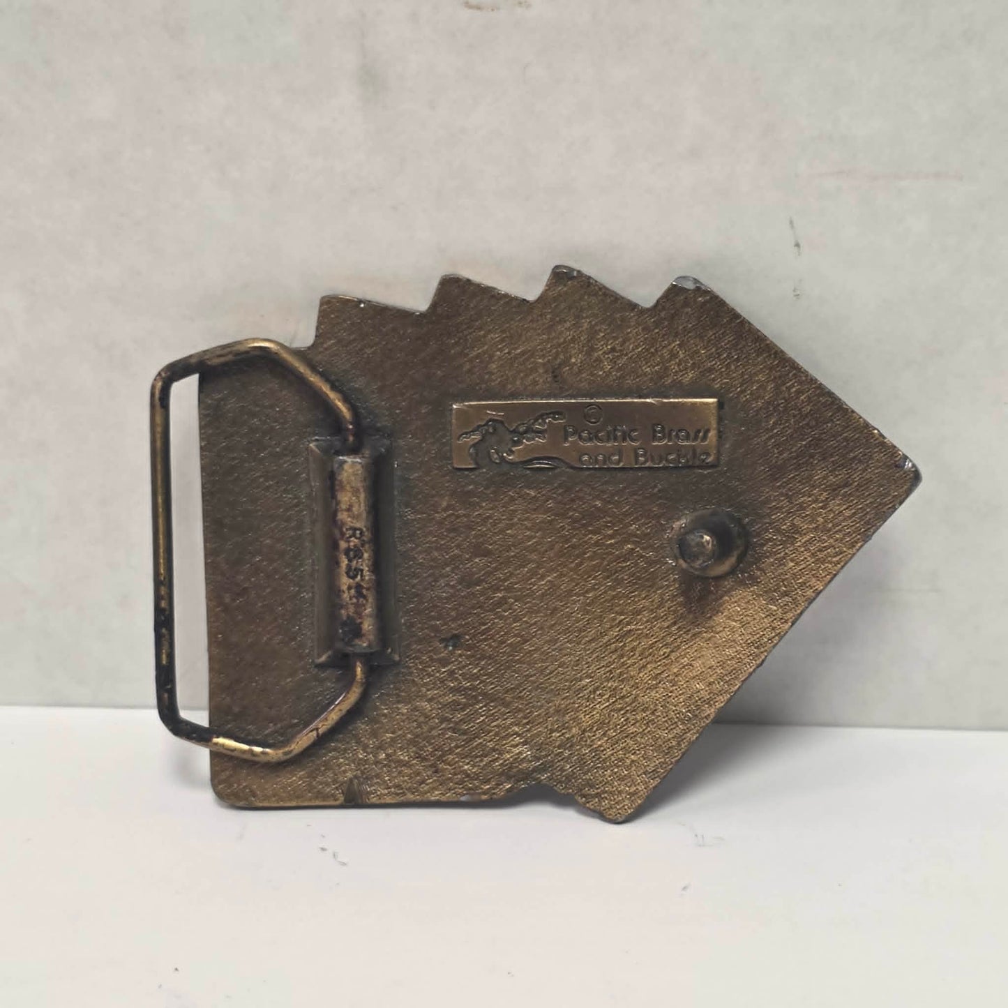 Vintage brass Las Vegas Nevada belt buckle featuring a straight flush poker hand by Pacific Brass and Buckle Co.
