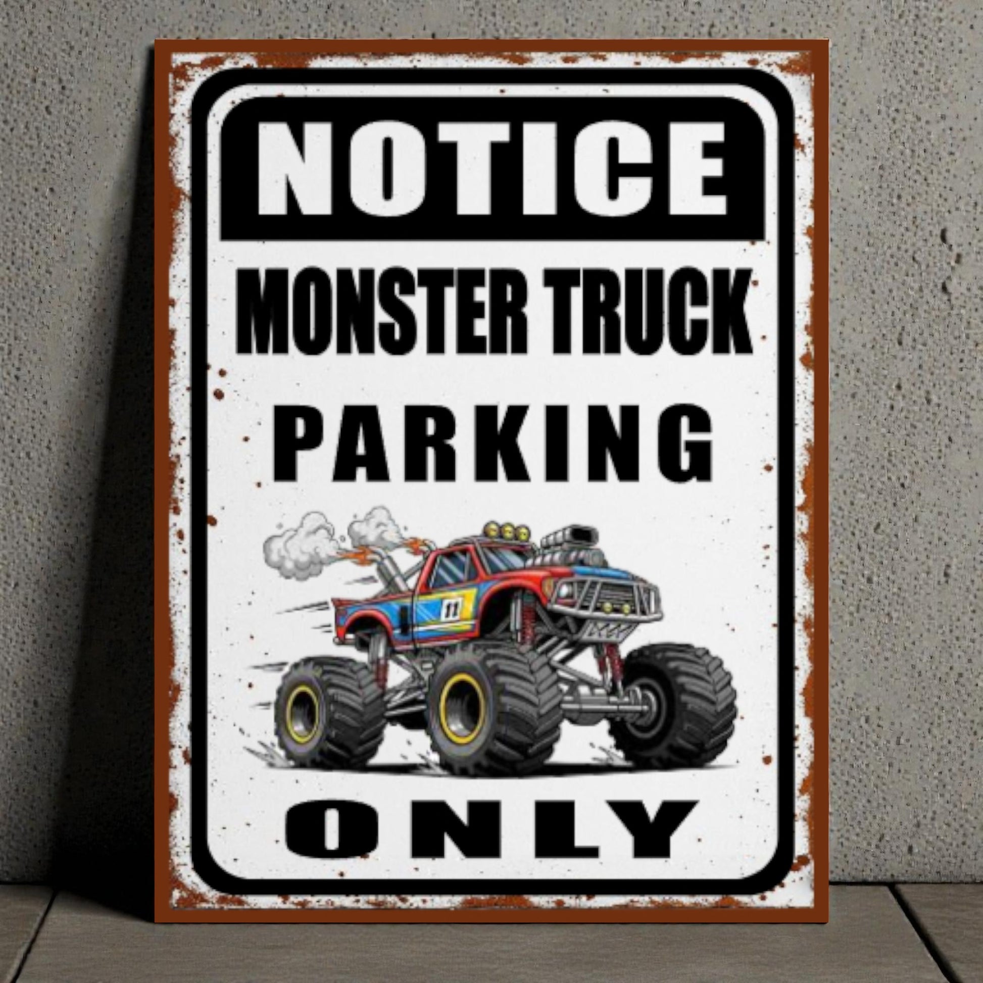 Metal sign with a monster truck graphic and text 'Notice Monster Truck Parking Only' on a gray background.