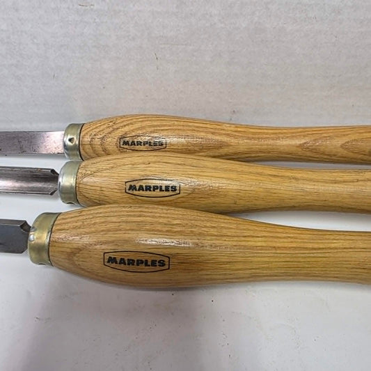 Three vintage Marples woodturning chisels including gouge, parting tool, and turning chisel.