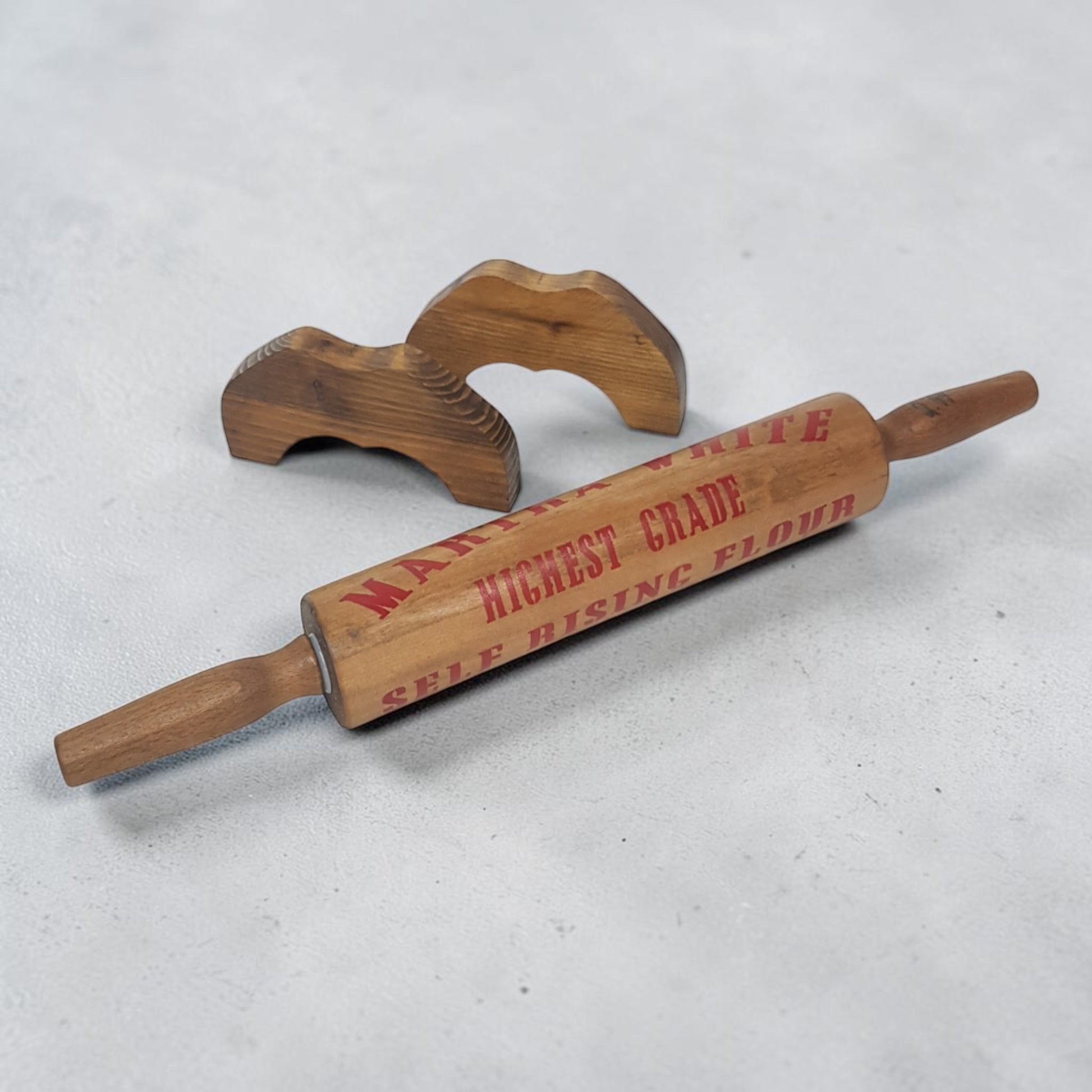 Vintage-style Martha White Flour rolling pin display piece with optional countertop display feet.