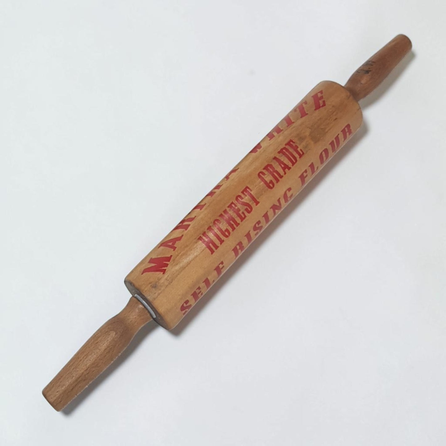 Vintage-style Martha White Flour rolling pin display piece with optional countertop display feet.